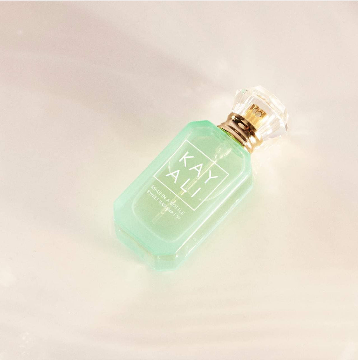 KAYALI 
Mini MAUI IN A BOTTLE SWEET BANANA | 37 Eau de Parfum.                                               Size: 0.33 FL OZ/10 ML eau de parfum spray
  Mini size